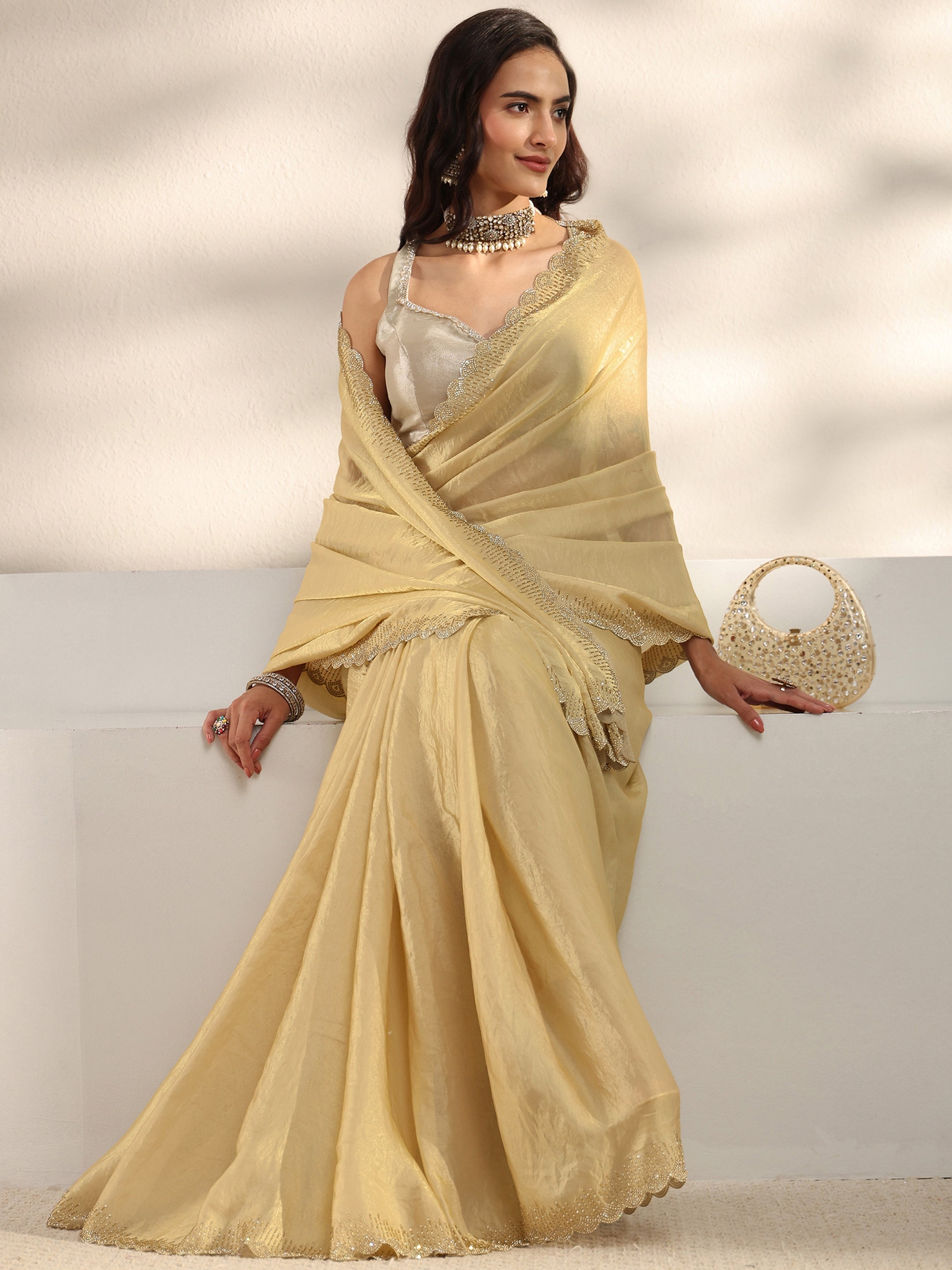 Beige Embellished Border Tissue Saree With Unstitched Blouse Piece